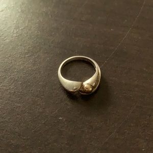 Silver ring with gold accent